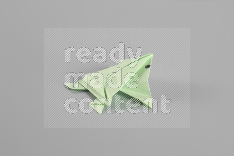 Origami animals on grey background