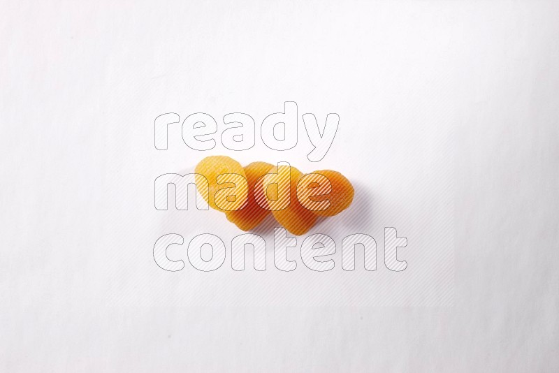 Dried apricots on white background