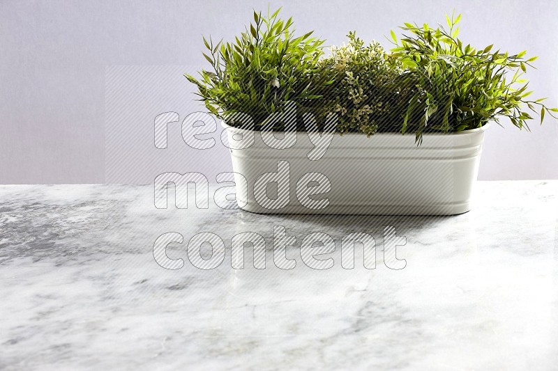 Multiable Artificial Plants in White Pot on Light Grey Marble Background 45 degree angle