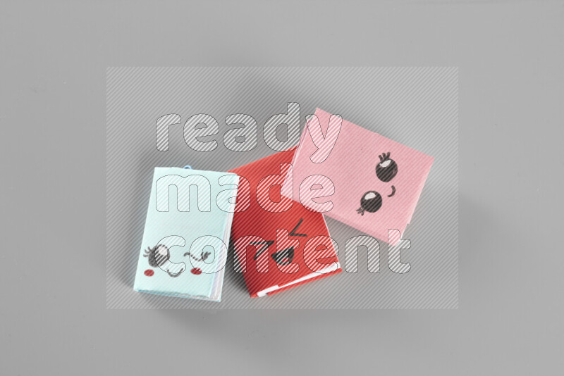 Origami book on grey background