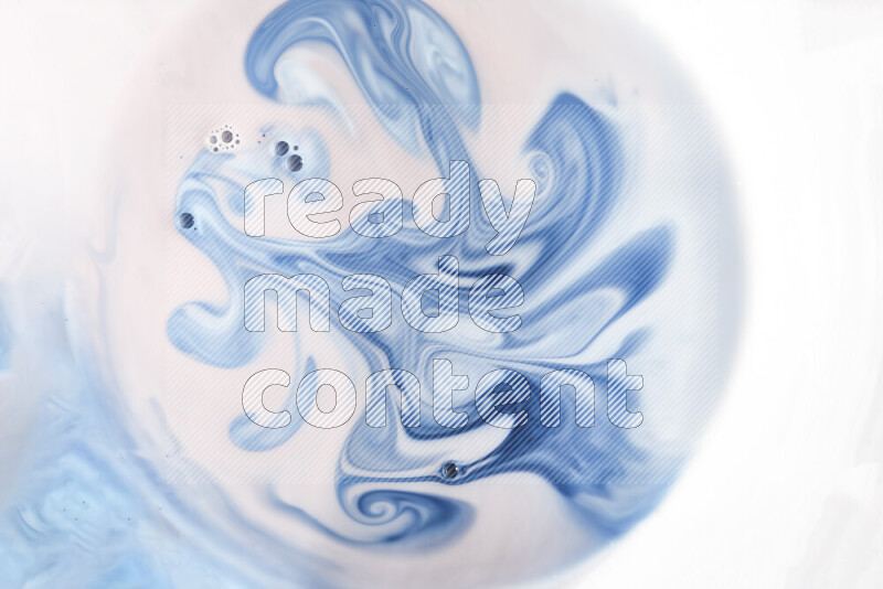 A close-up of abstract swirling patterns in blue and white