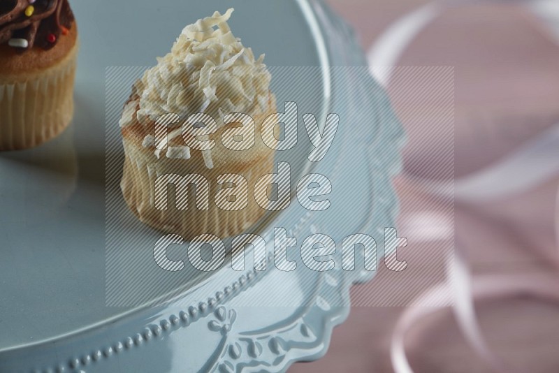 Vanilla mini cupcake topped with coconut