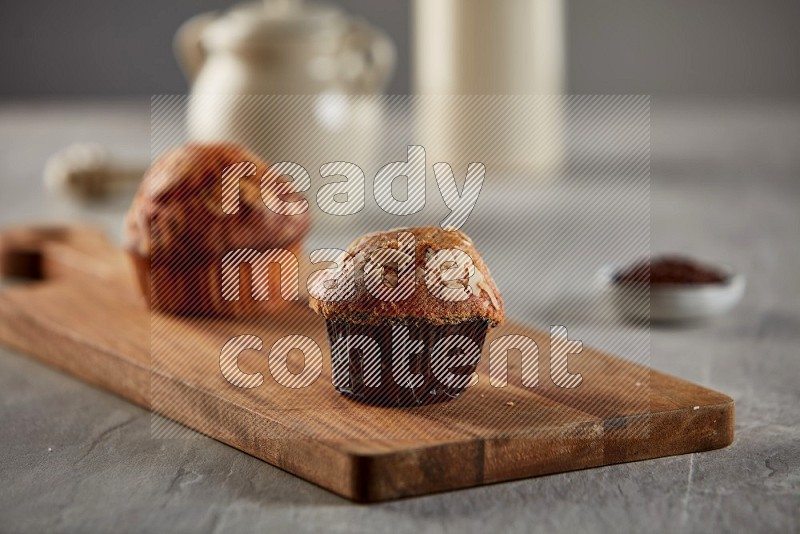 Peanut cupcake on a wooden board