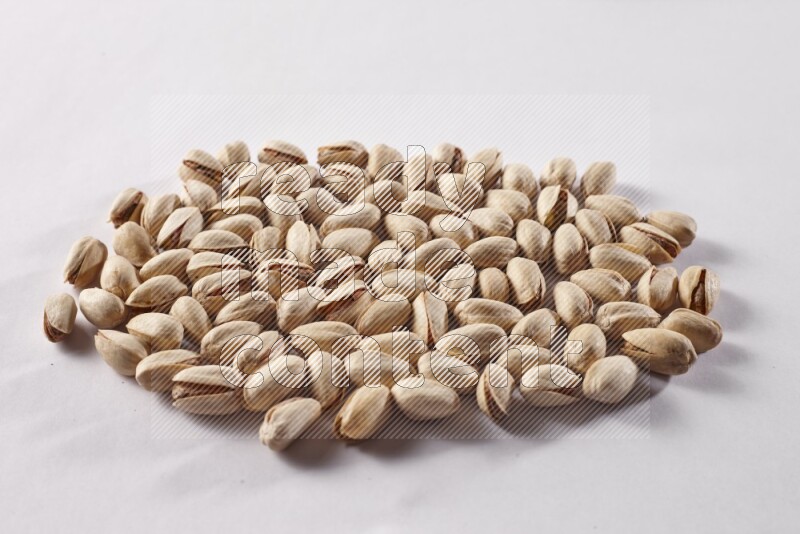 Pistachios on white background