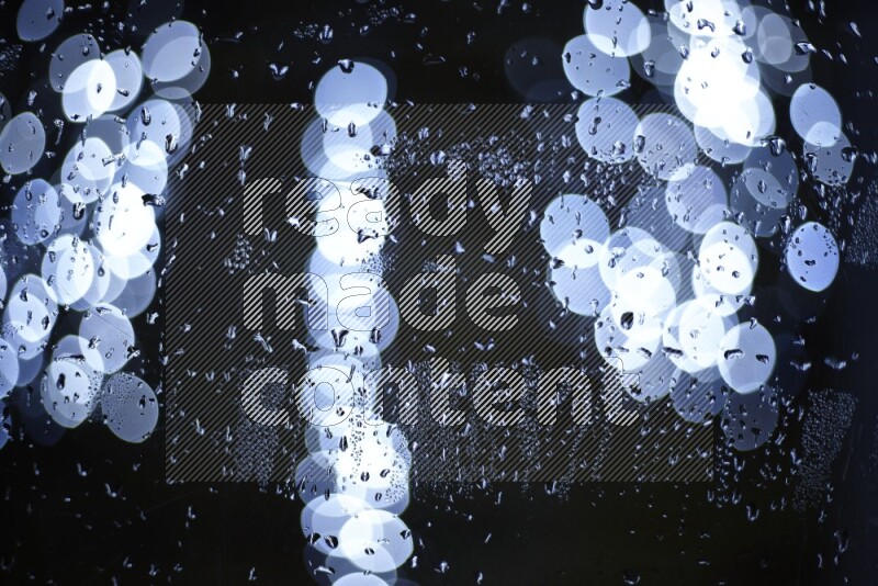 Bokeh light in white with water drops