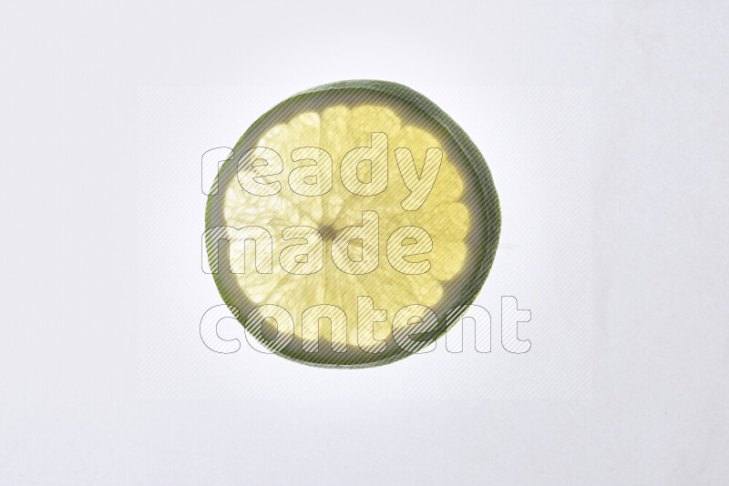 Orange slices on illuminated white background