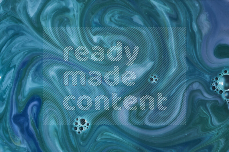 لقطة مقربة لأنماط دوامية باللون الأزرق والأخضر