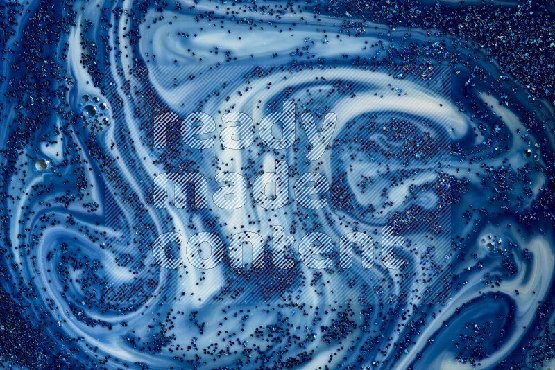 لقطة مقربة لبريق أزرق متلألئ منتشر على خلفية من اللون الأزرق والأبيض في حركات دائرية