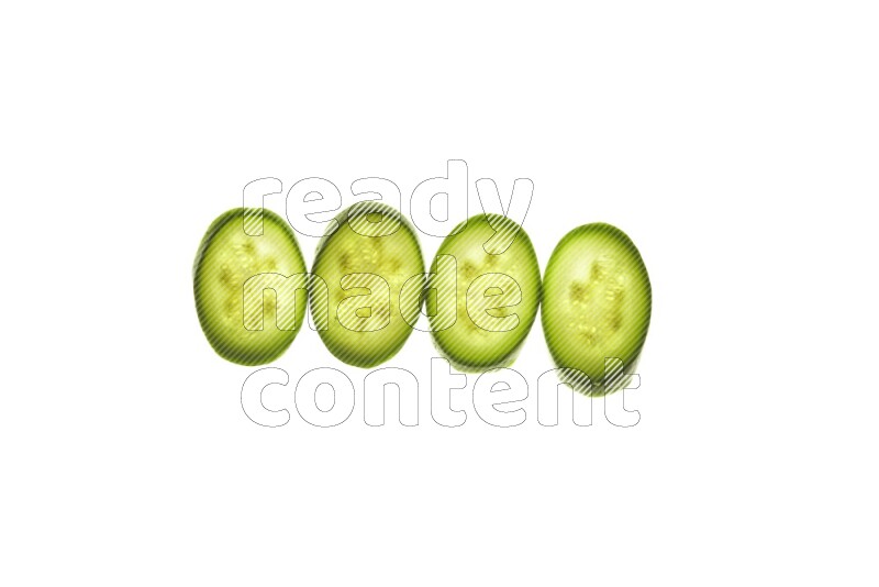 Zucchini slices on illuminated white background