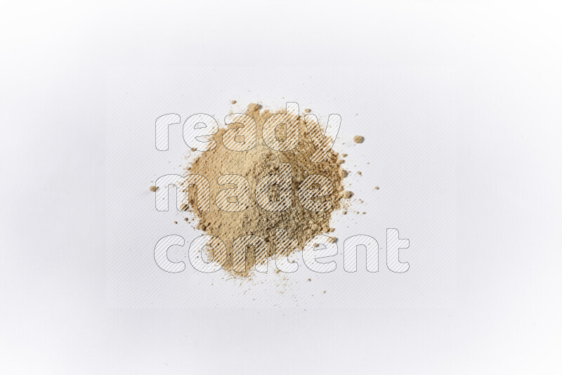 A bunch of ground ginger powder on white background