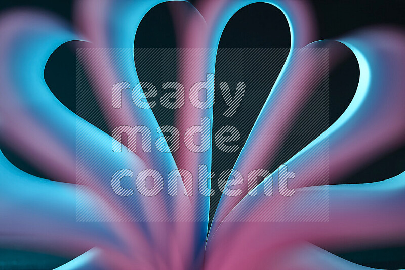 An abstract art piece displaying smooth curves in blue and pink gradients created by colored light