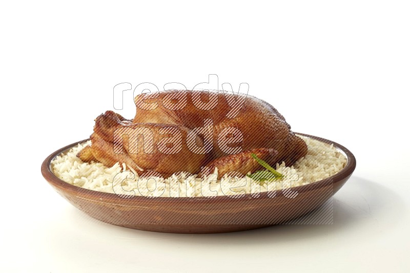 white  basmati Rice with  whole roasted chicken    on a pottery plate  direct  on white background