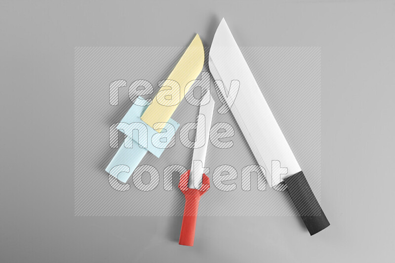 Origami sword on grey background