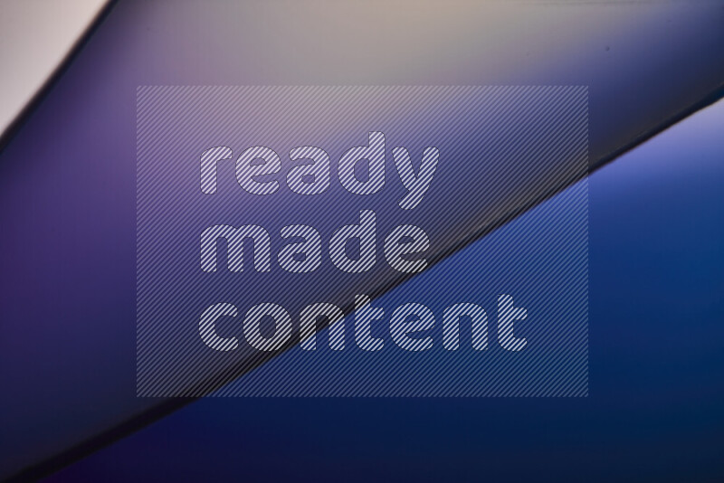 An abstract art piece displaying smooth curves in cold gradients created by colored light