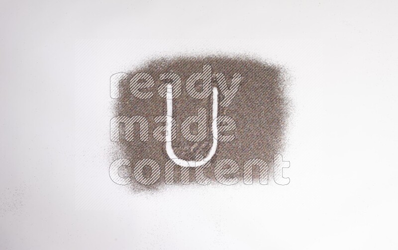 Alphabets written with glitter on white background