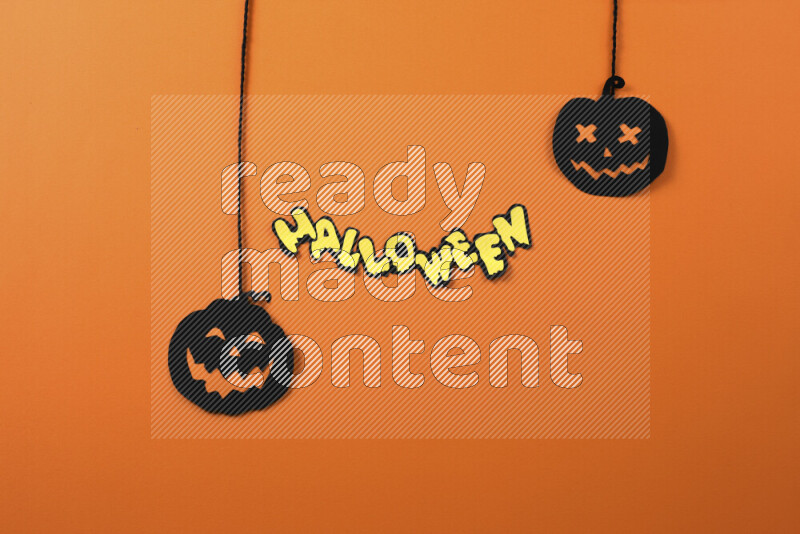 Halloween hand crafts on orange background