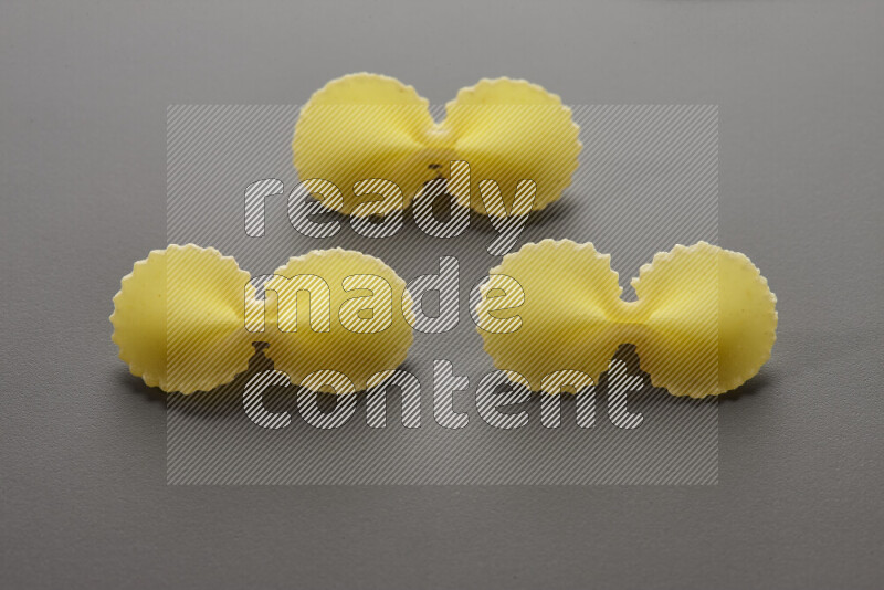 Fiocchi pasta on grey background
