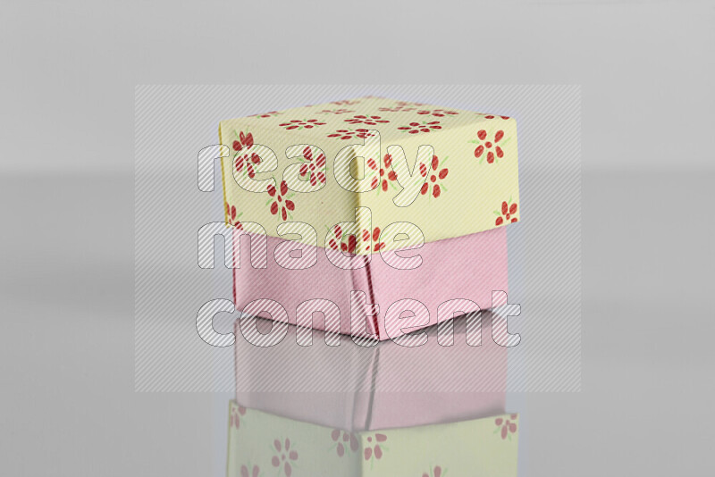 Origami gift box on grey background