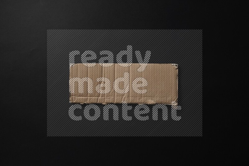 Cardboard on black background