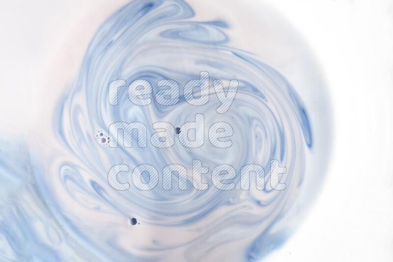 A close-up of abstract swirling patterns in blue and white