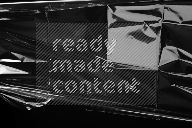 Plastic wrap texture on black background