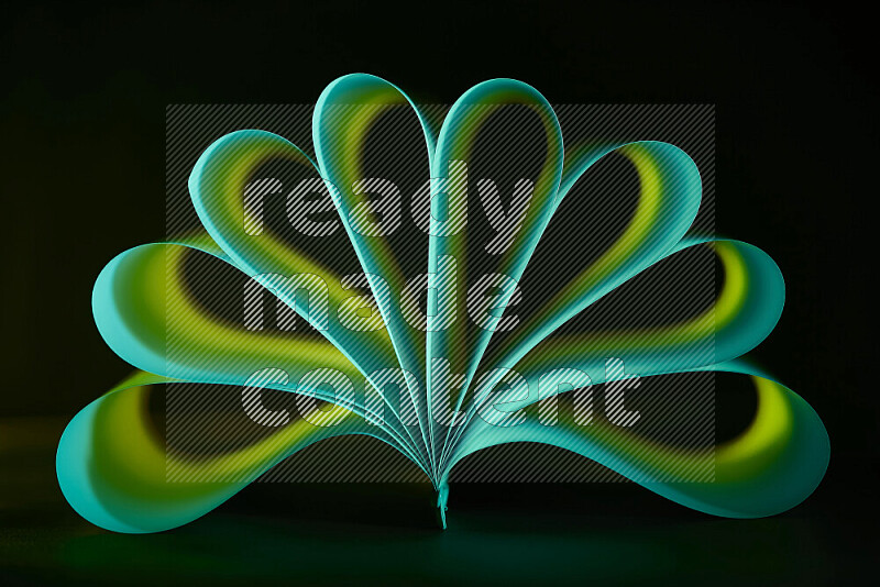 فن تجريدي يعرض منحنيات وتدرجات اللون الأخضر مكونه بضوء ملون