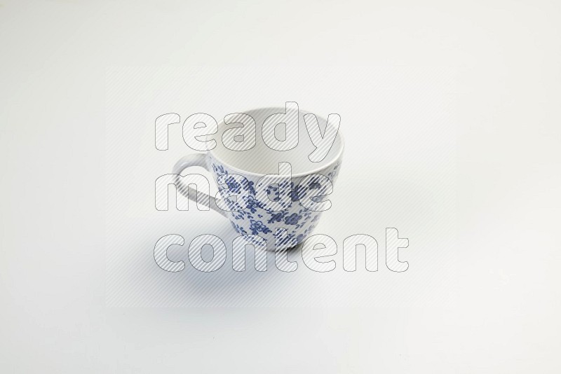 white and blue mug on white background