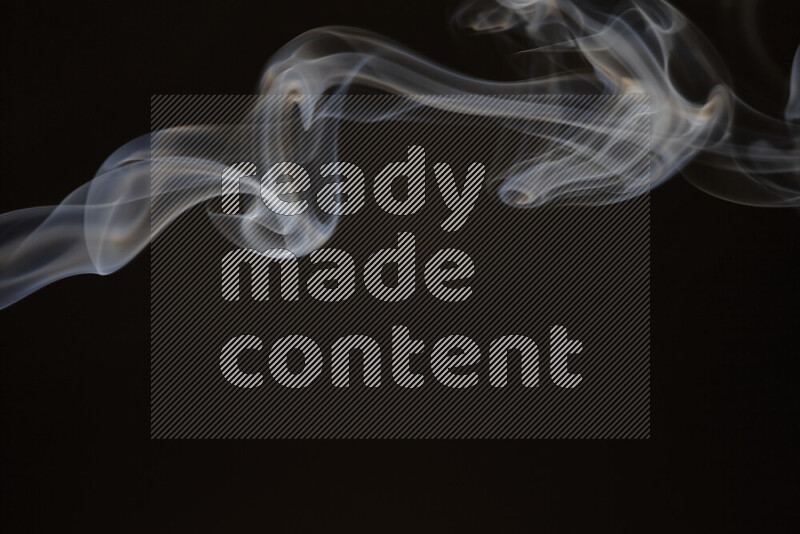 Motion of wavy smoke isolated on dark background