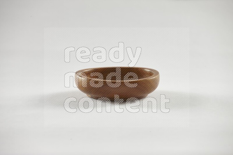A wooden bowl on white background