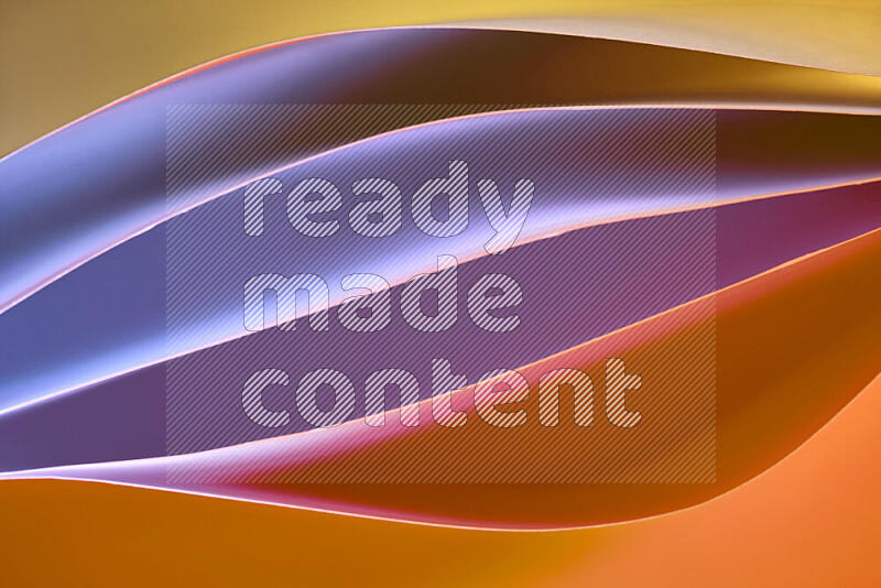 This image showcases an abstract paper art composition with paper curves in different cold and warm gradients created by colored light