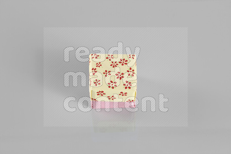 Origami gift box on grey background