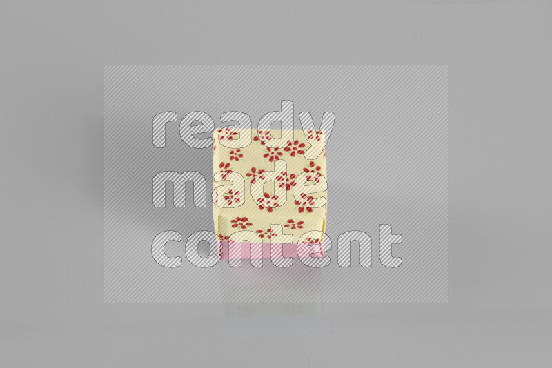 Origami gift box on grey background