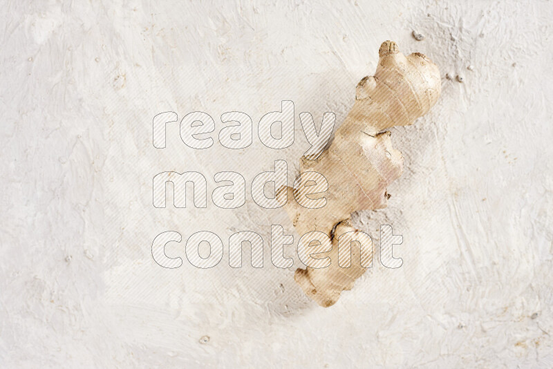 Fresh ginger root on white background