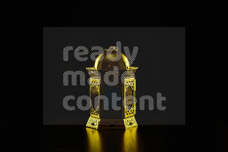 Ramadan lanterns with colored rim light against black background