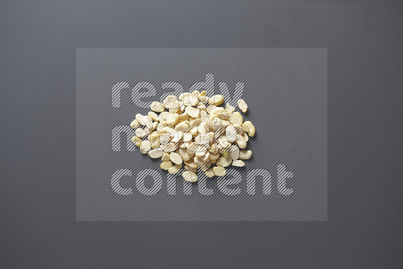 Crushed beans on grey background