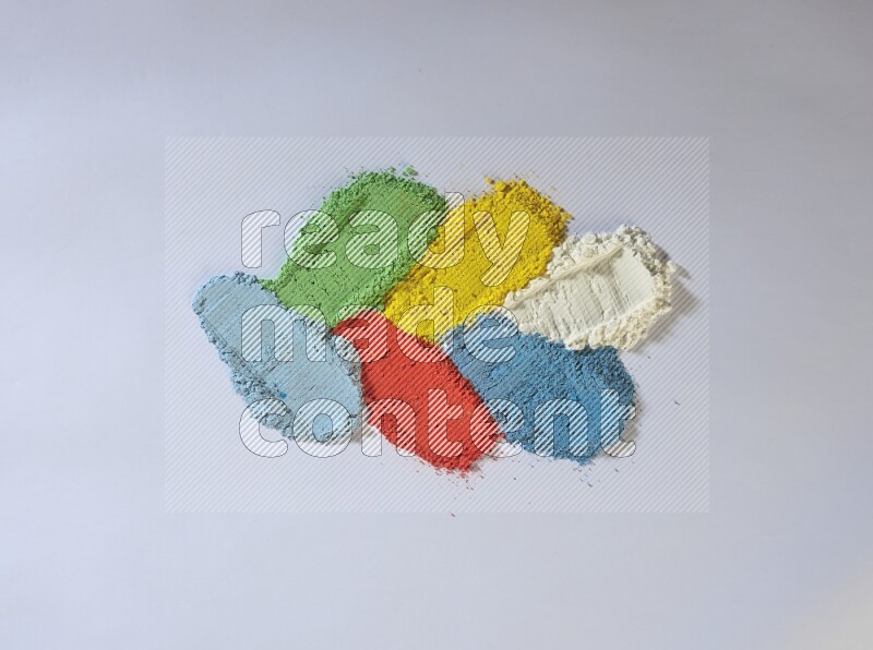 Multicolored powder strokes on white background