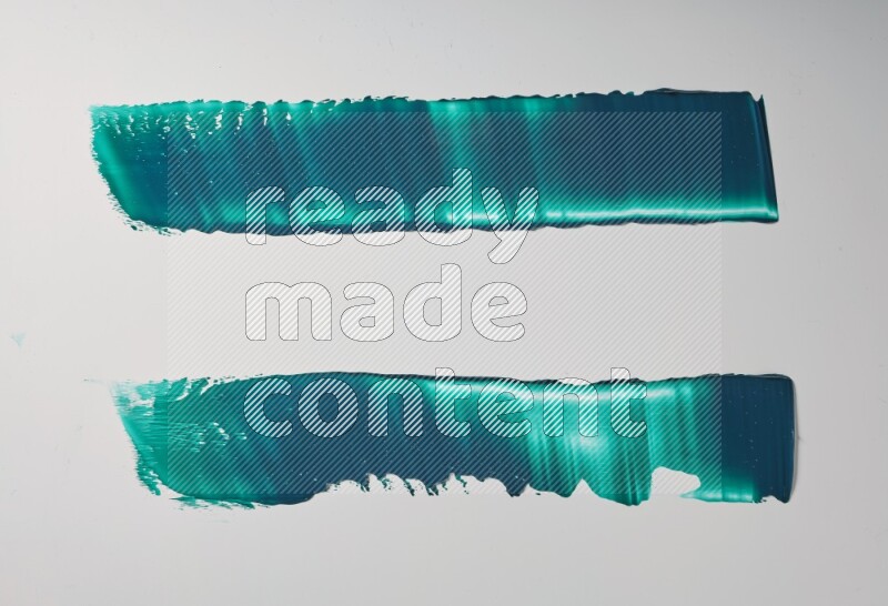 Turquoise painting knife strokes on white background