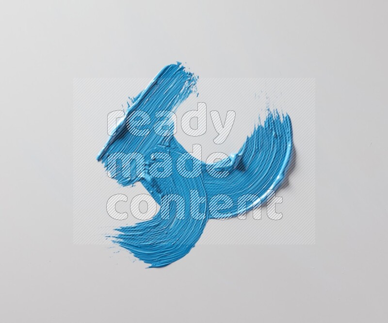 Multi blue curved brush strokes shaped into different shapes on a white background