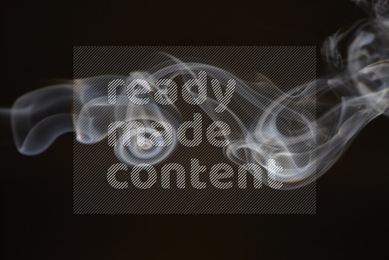 Motion of wavy smoke isolated on dark background