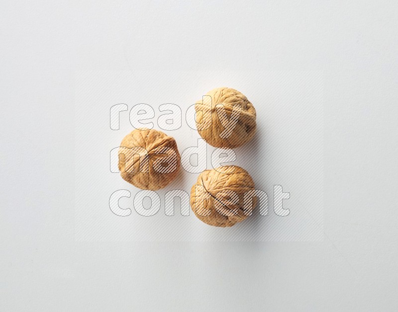 Top-view shot of walnut on white background