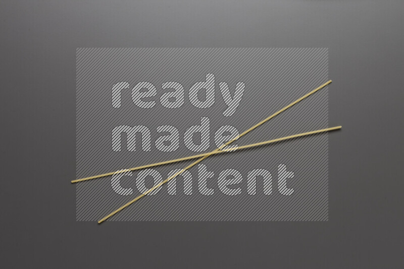 Spaghetti pasta on grey background