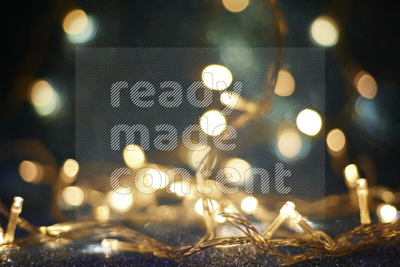 Bokeh light in yellow with blue background