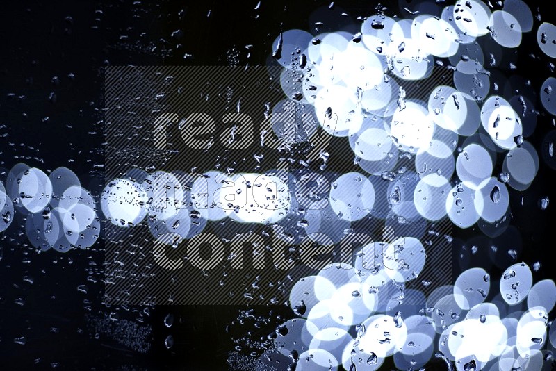 Bokeh light in white with water drops