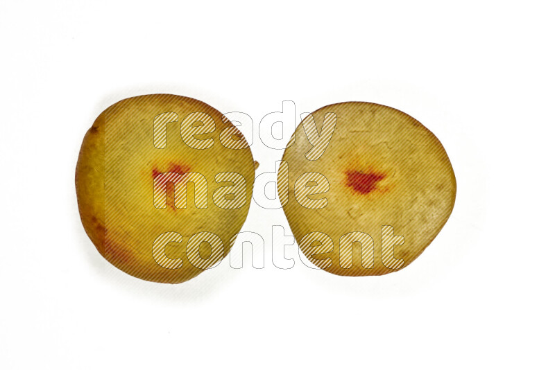 Peach slices on illuminated white background