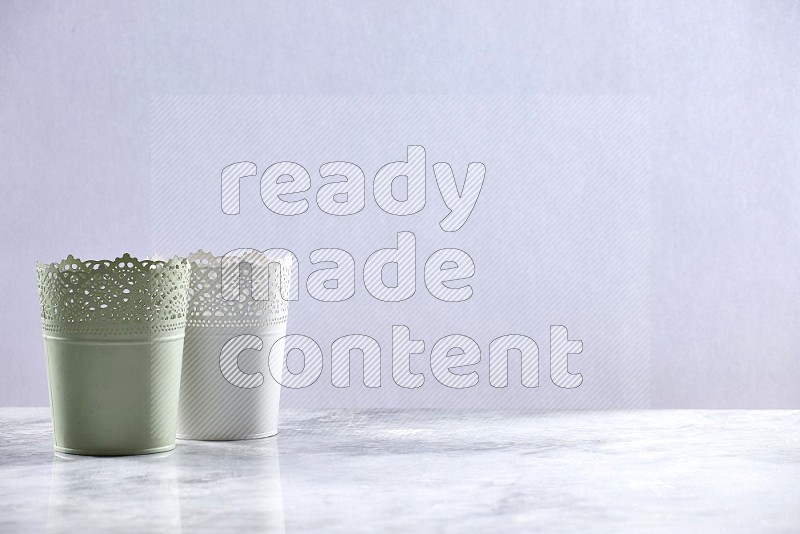 Empty Light Green & white Plant Pots on light grey Marble Flooring 15 degree angle