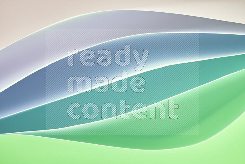 This image showcases an abstract paper art composition with paper curves in green and different warm gradients created by colored light