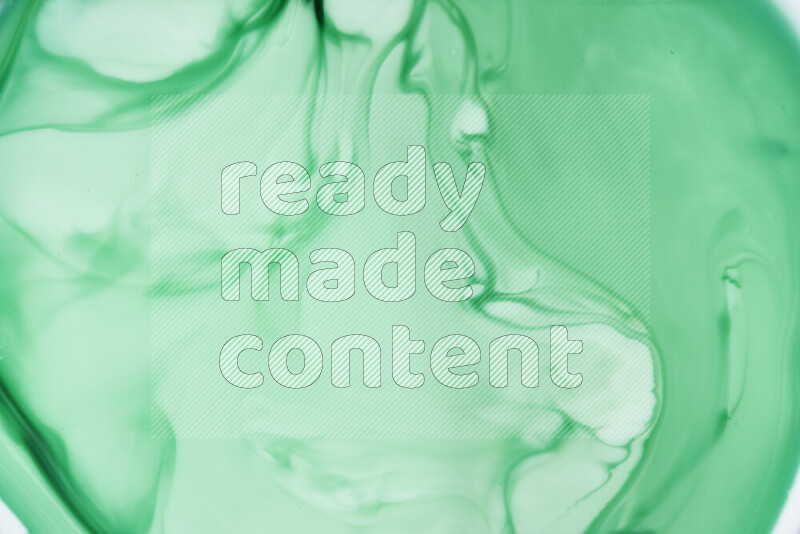 لقطة مقربة لأنماط دوامية بتدرجات اللون الأخضر