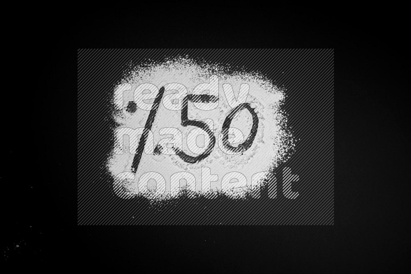 Percentages written with powder on black background