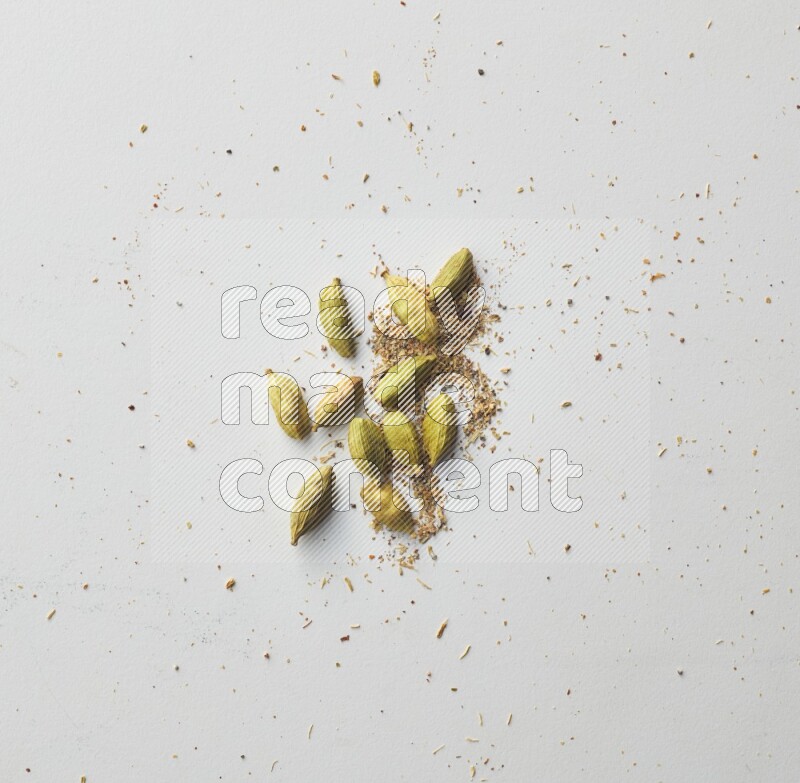 Top-view shot of Cardamon on white background