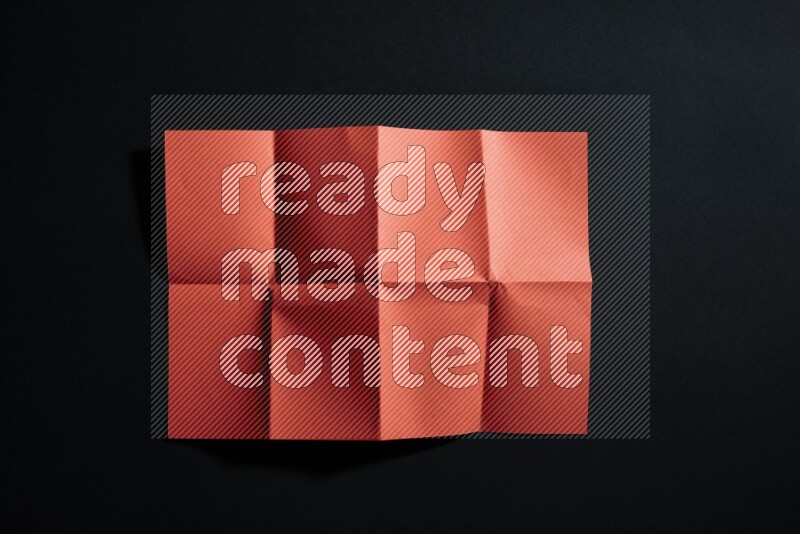 White paper sheet on black background